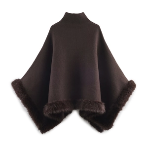Deep coffee knit shawl with turtleneck design and faux fur trim along the asymmetrical hem