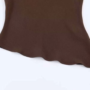 Close-up of chocolate brown tank top featuring a unique irregular wavy hemline design