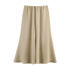 Detailed view of champagne satin midi skirt showing smooth glossy fabric and flowing drapes