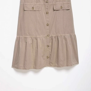 Chic khaki cotton midi skirt featuring front resin buttons and ruffled flounce hem detail