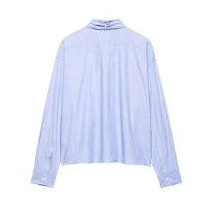 Light blue long sleeve shirt for women with back bow detail and drop shoulder design