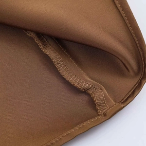 Elegant dark brown satin midi skirt featuring high-quality edge stitching and silky texture