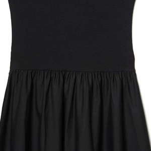 Black sleeveless knit patchwork midi dress showing waist detail and slim fit waistline