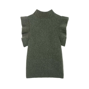 Detailed view of dark green knit sweater with ruffle layers and wool texture