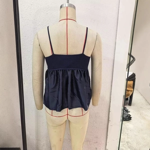 Navy blue V-neck knitted camisole with satin patchwork and ruffled hem, back view