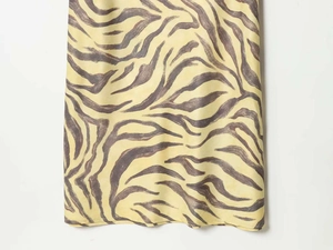 Detail showing the zebra pattern fabric and clean stitching on this elegant summer dress