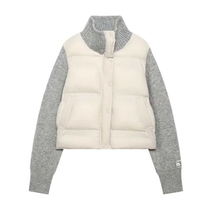 Women's cream quilted jacket with grey knit sleeves and neck in a minimalist design
