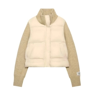 Quilted off-white puffer jacket with beige knit sleeves and ribbed stand collar design