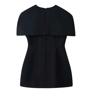 Detail view of black dress featuring a cape-style back with a hidden center zipper