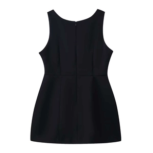 Rear view of minimalist black sleeveless dress showing the invisible back zipper closure