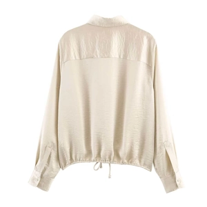 Elegant champagne satin long sleeve shirt featuring back yoke detail and adjustable drawstring hem