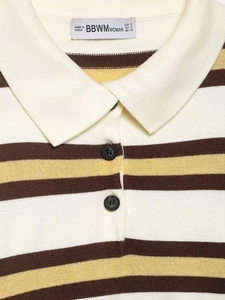 Detailed close-up of striped knit polo shirt collar with buttons and brand neck label