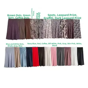 Detailed color matrix showing various satin midi skirts in solid colors and animal prints
