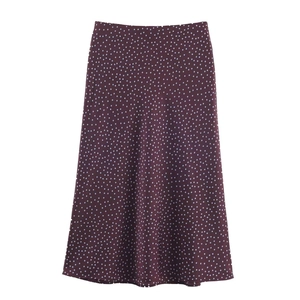 Elegant wine red satin A-line midi skirt with white polka dots for a classic summer look