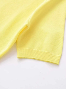 Detailed close-up showing the fine knit texture and ribbed cuff of the yellow V-neck top