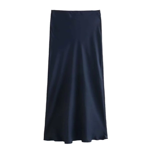 Detail of elegant navy blue satin midi skirt with smooth silky texture and high waist