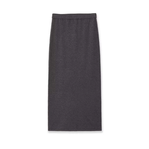 Detail of dark charcoal knit maxi skirt with elastic waistband and fine ribbed texture