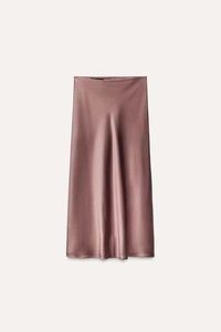 Elegant mauve satin midi skirt detail showing premium drape and silky fabric texture