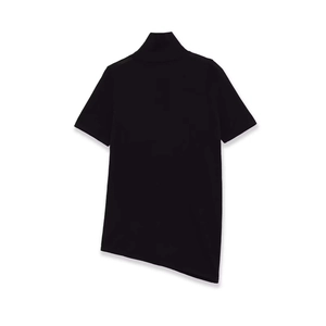 Detail of black high-neck knit top showing the asymmetric hem and soft ribbed texture
