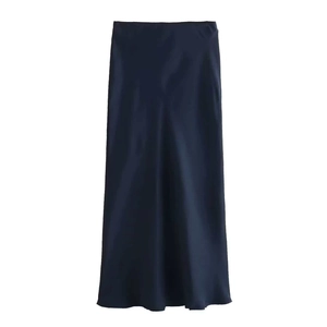 Detailed view of dark blue satin midi skirt showing high-waist cut and silky fabric texture