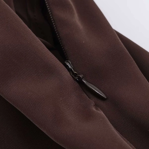 High-waist brown paperbag skirt featuring a seamless invisible zipper and metal puller