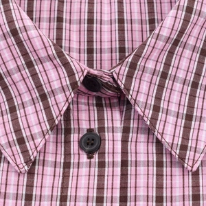 Pink and brown checkered shirt detail with collar and dark resin buttons