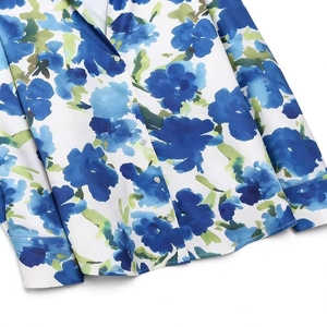 Elegant white satin shirt with large blue floral print and front button closure