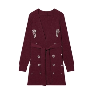 Elegant burgundy knit cardigan with V-neckline and sparkling rhinestone embellishments
