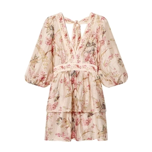 Floral V-neck tiered dress with puff sleeves and beige silk texture in flat lay view