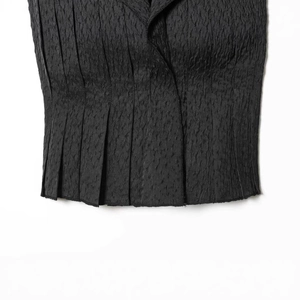 Chic charcoal black strapless top featuring sophisticated crinkled pleat texture fabric