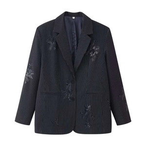 Dark blue pinstripe blazer with black floral embroidery and sequins on white background