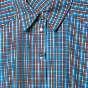 Blue and brown plaid dress with classic shirt collar and silver snap buttons detail
