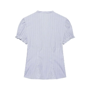 Detail view of blue and white striped shirt back with puff sleeves and waist stitching
