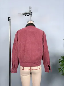Back view of a mauve corduroy jacket with contrast leather collar and elastic hem details