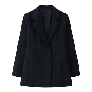 Detail of the double-breasted buttons and flap pockets on this black slim-fit blazer
