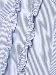 Detail of blue and white striped shirt featuring ruffled v-neckline and soft cotton texture