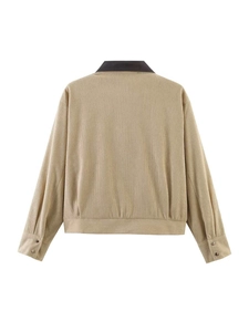 Back view of beige corduroy jacket featuring a contrast dark leather collar and cuff detail
