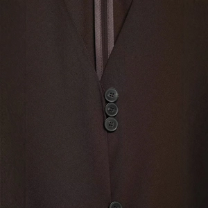 Deep brown minimalist V-neck tank top featuring asymmetrical lace hem and refined buttons