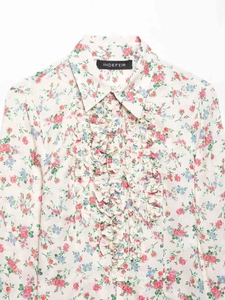 Detailed view of long-sleeve floral chiffon shirt with ruffled front and pointed collar