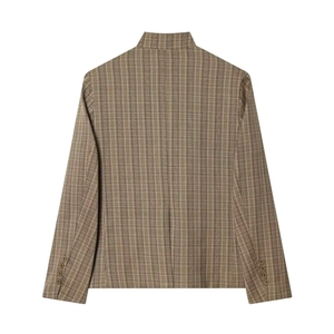Detail view of brown checked blazer back with decorative sleeve buttons and micro texture