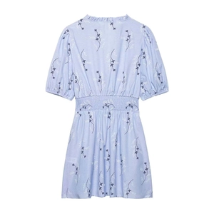 Light blue floral short sleeve dress with smocked waist and puffed sleeves back view