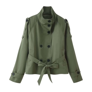 Detail of army green short trench coat featuring double-breasted buttons and epaulets