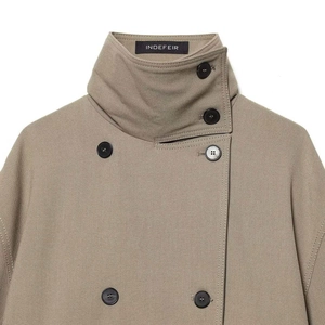 Khaki double-breasted trench coat with high neck stand collar and button details
