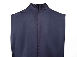 Detail of navy satin dress back with high neck and invisible zipper closure