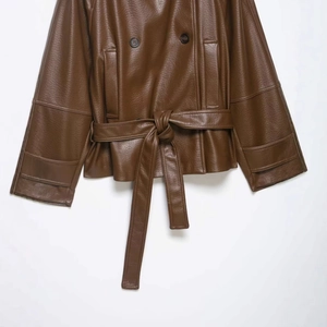 Dark brown faux leather biker jacket with double-breasted buttons and a waist belt