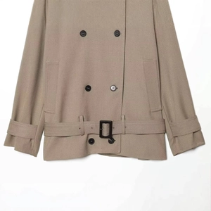 Khaki double-breasted short trench jacket with waist belt and buckle cuffs for women