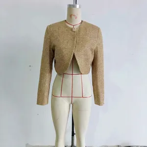 Elegant gold tweed cropped jacket for women featuring a round neck and metallic button detail