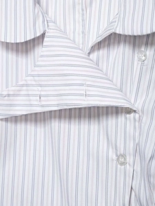 Close-up of blue pink and grey striped cotton poplin shirt with transparent buttons