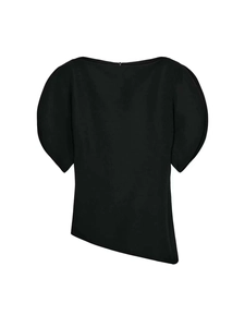 Detail of minimalist black blouse with asymmetric neckline and puff sleeves