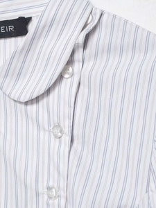 Close-up of the striped cotton poplin shirt collar with white buttons and blue stripes